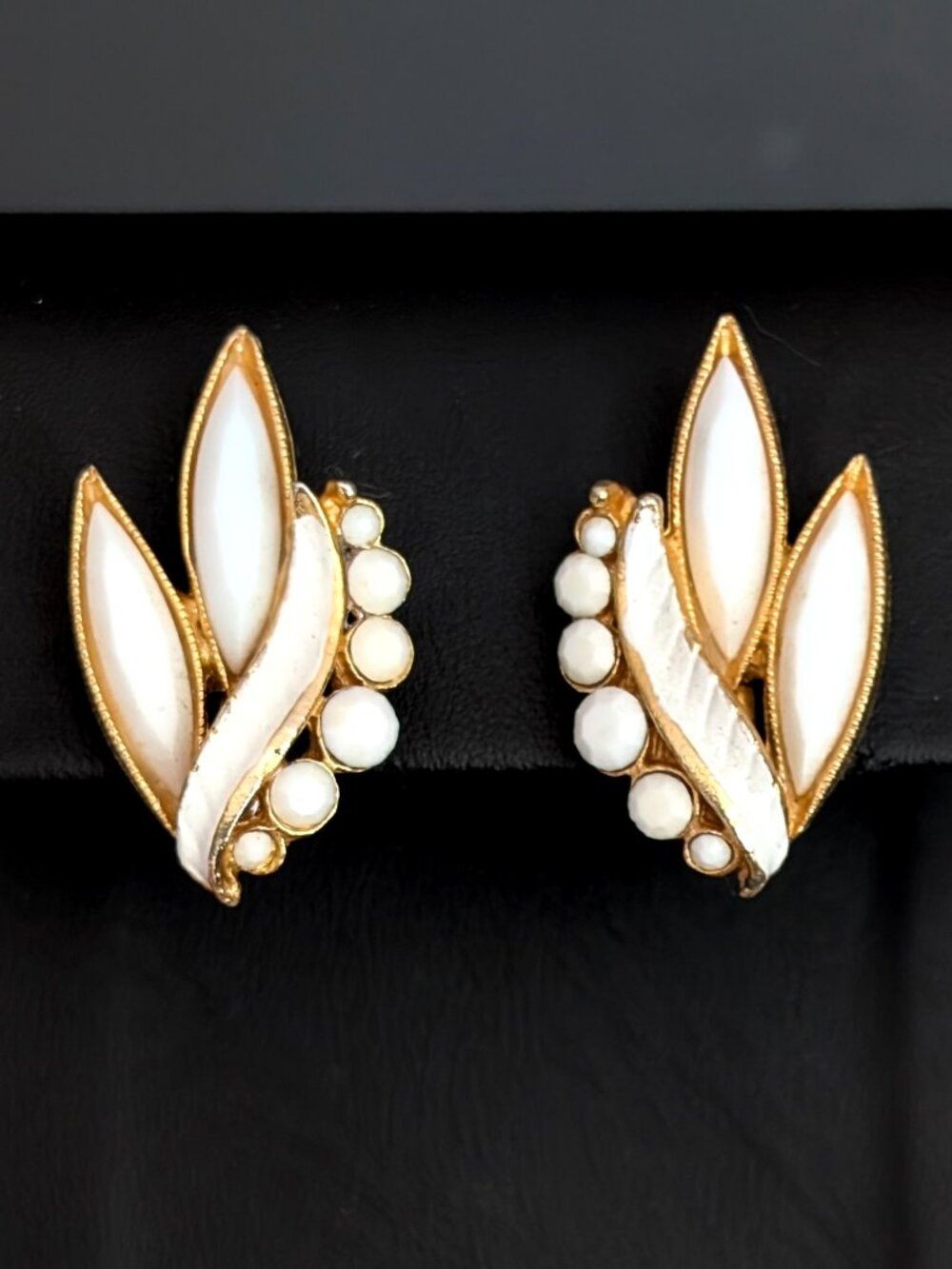 Vintage gold tone and white clip on earrings